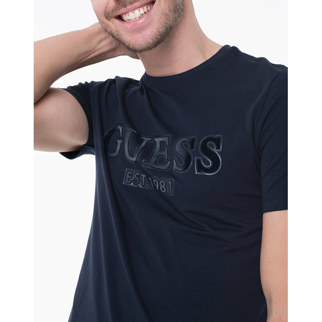 Product GUESS SS CN SPRAYED FLOCK LOGO TEE ΜΠΛΟΥΖΑ ΑΝΔΡΙΚΟ base image